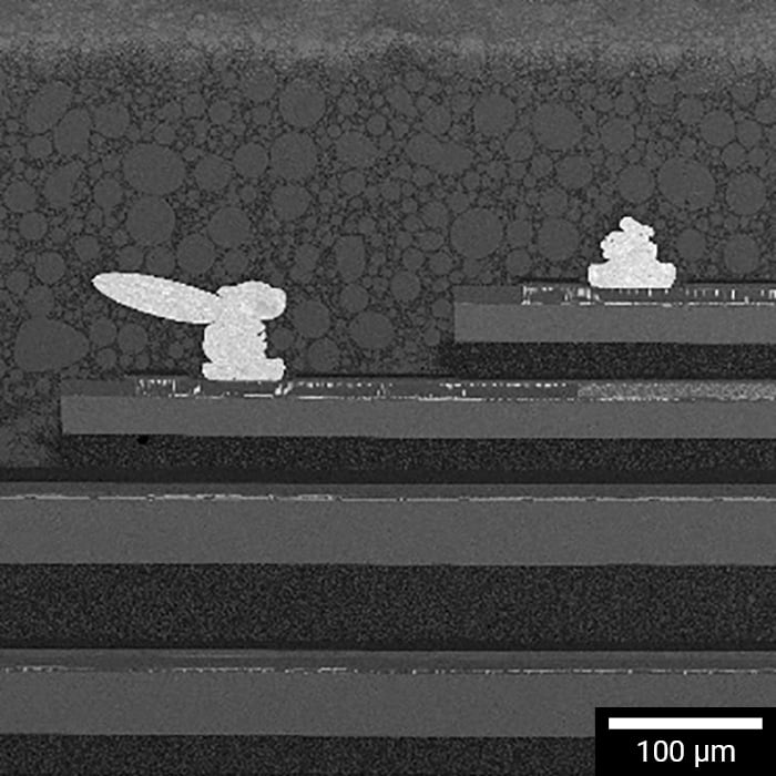 Cross section of multiple dies in advanced package, prepared by laser ablation and Plasma FIB.