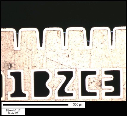 Specimens EXLO manipulated to a slotted Cu half grid ready for low energy polishing.
