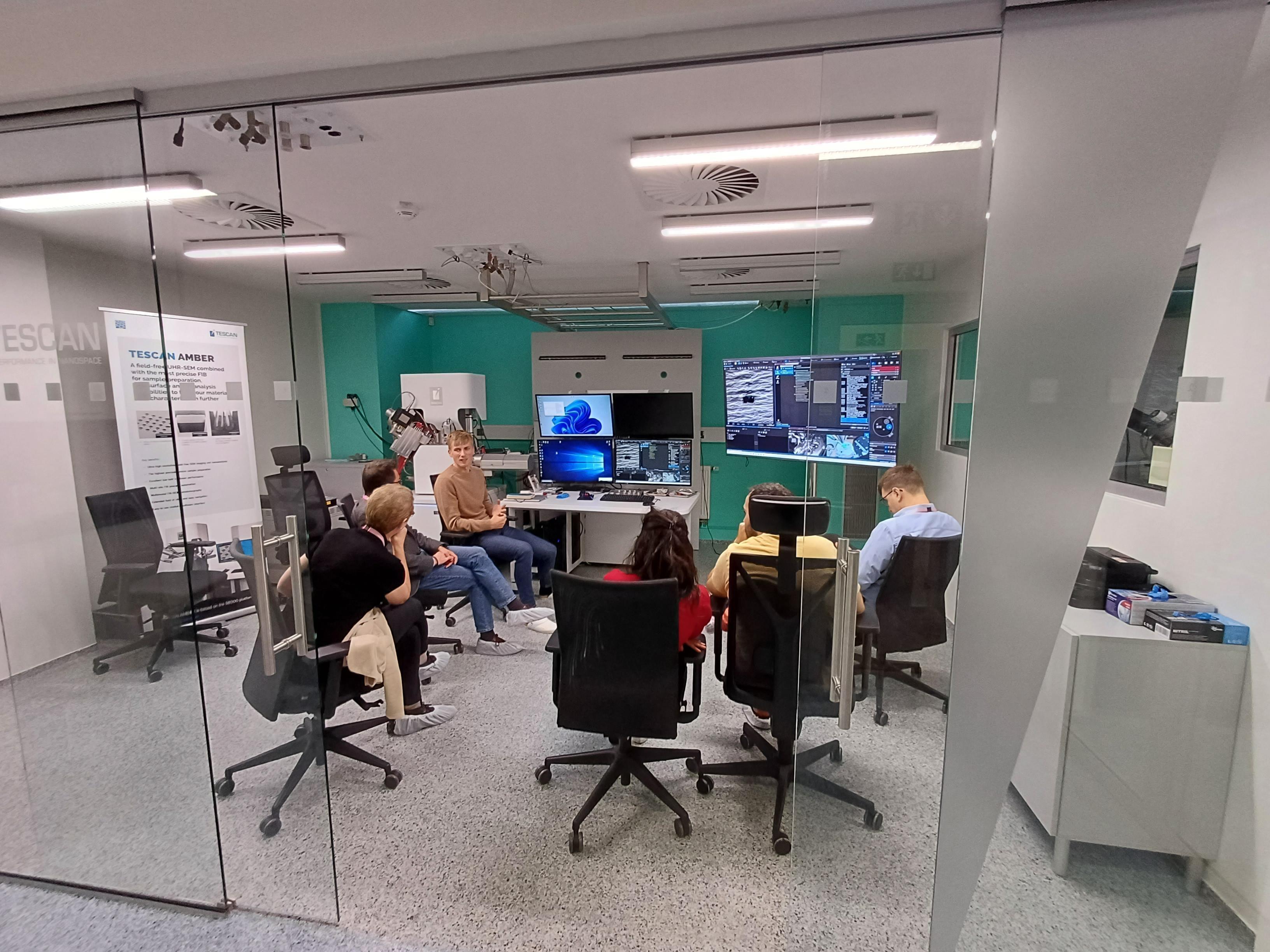 Tescan experts demonstrating TEM lamella preparation at the CMC Workshop 2025.