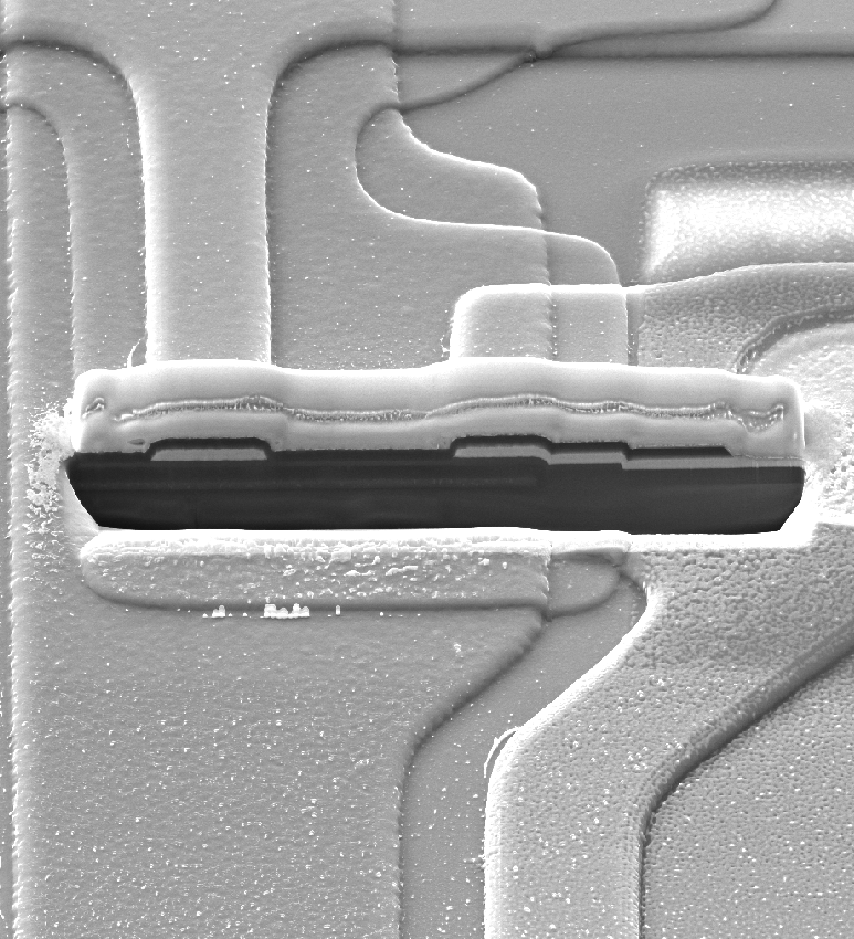 Ultra-high vacuum FIB column for ion implantation and nanofabrication